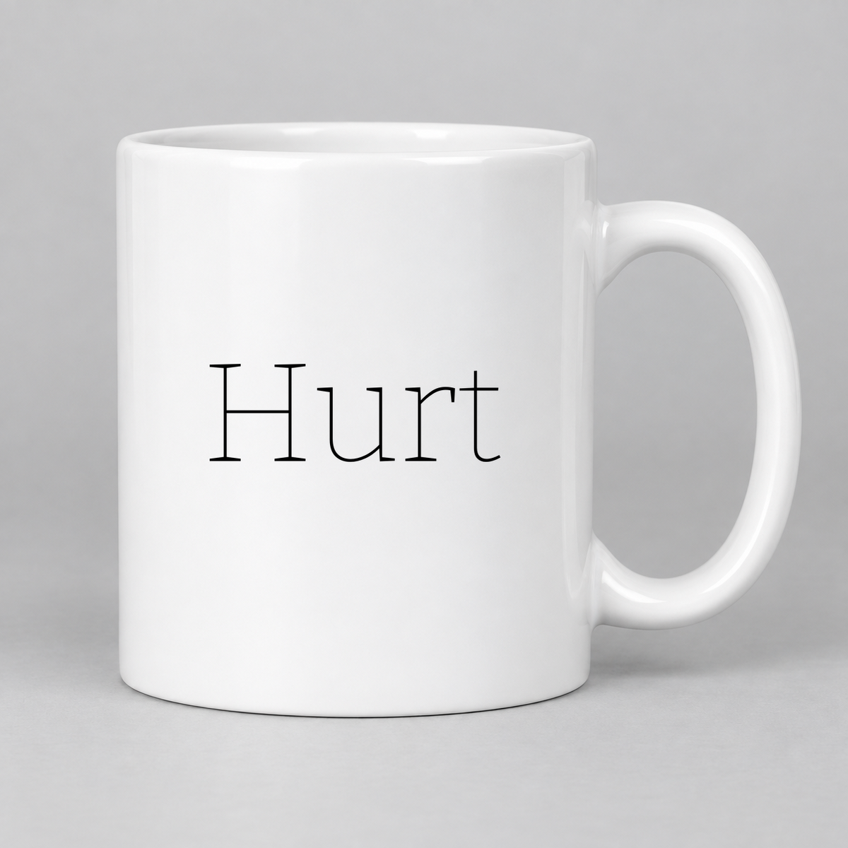 Hurt Mug in white