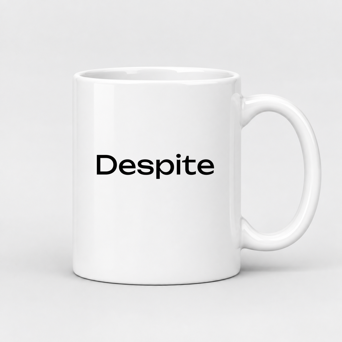 Despite Mug in white