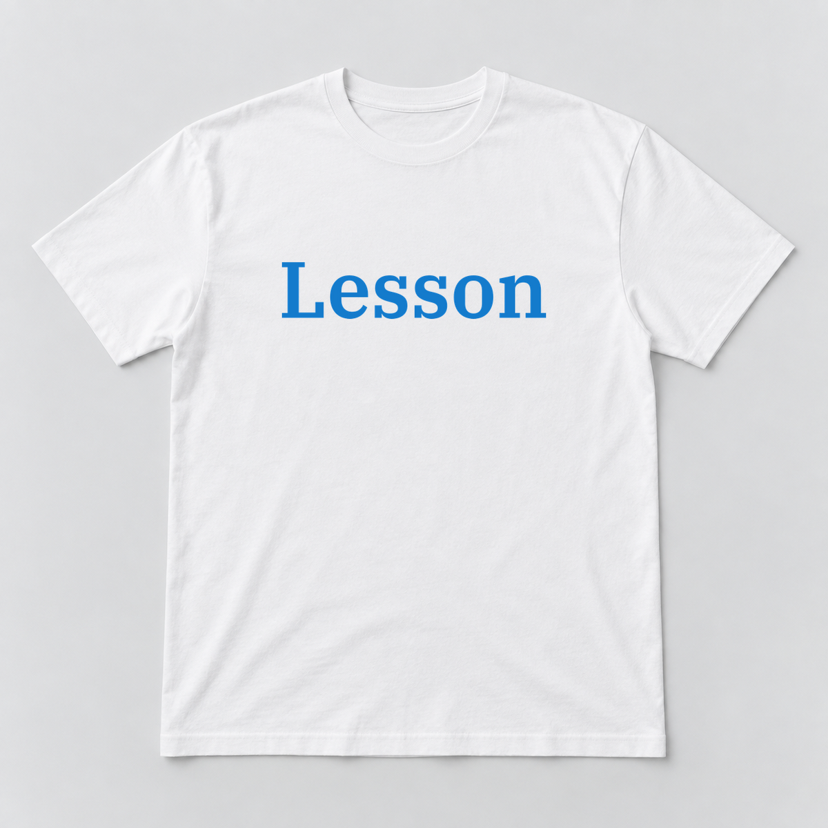 Lesson T-Shirt in white with blue text