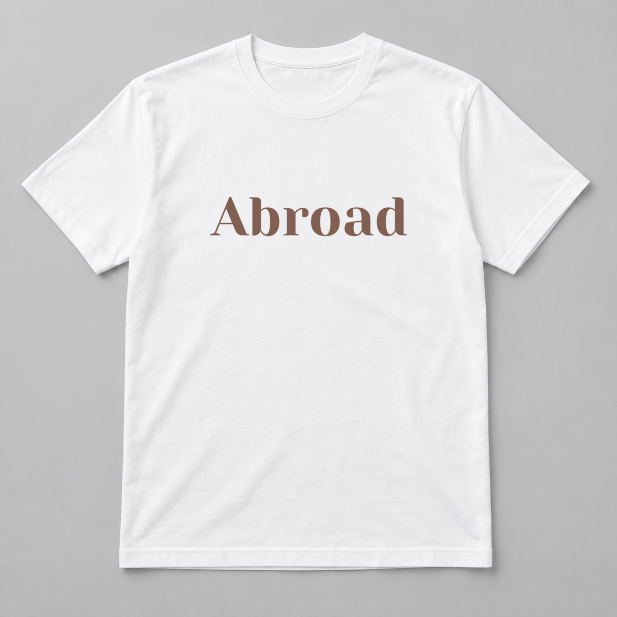 Abroad T-Shirt in white with brown text