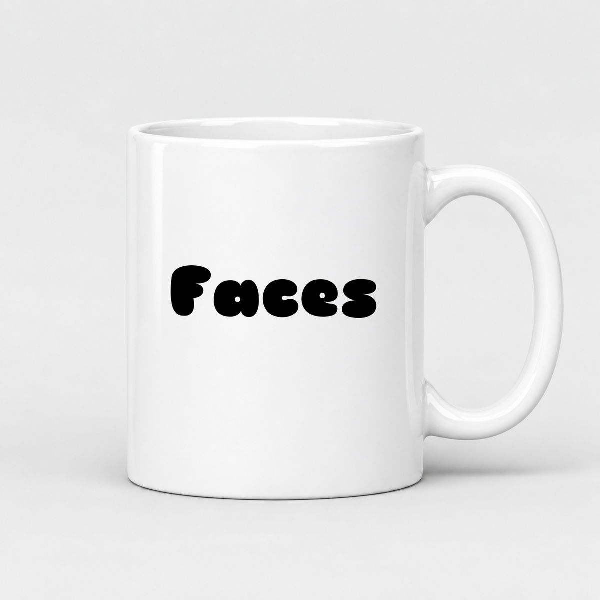 Faces Mug in white