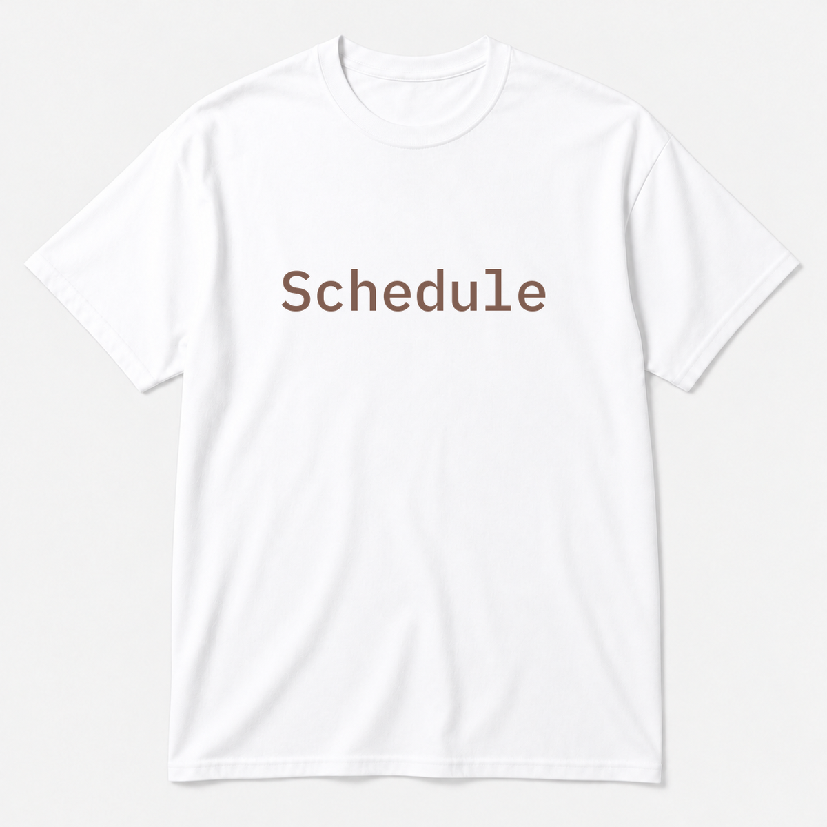 Schedule T-Shirt in white with brown text