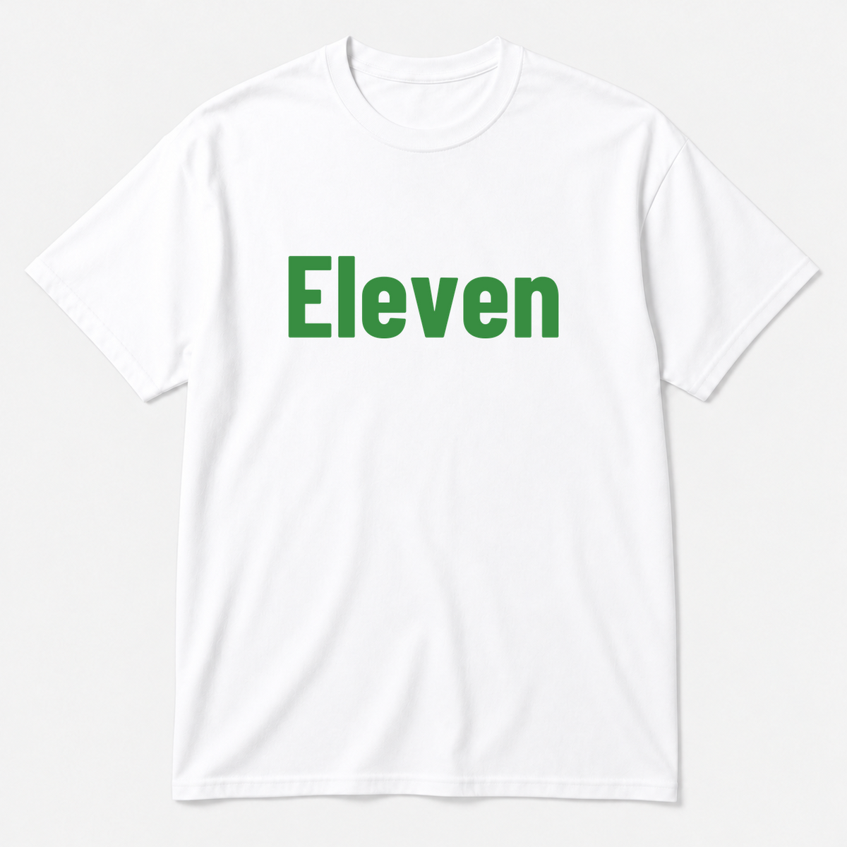 Eleven T-Shirt in white with green text