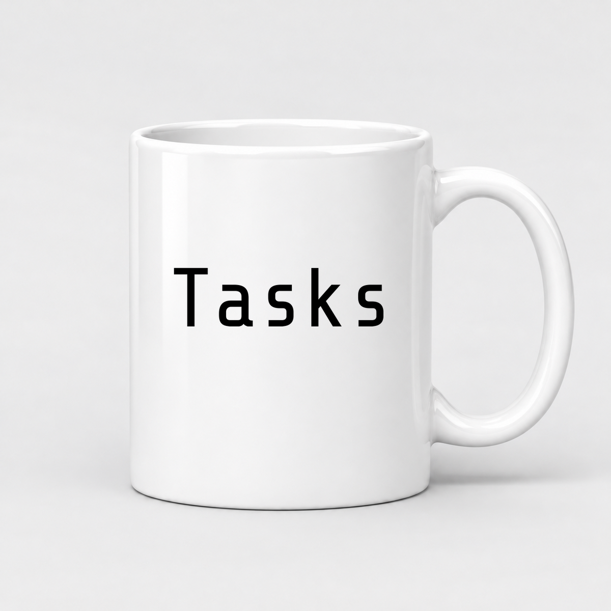 Tasks Mug in white with handle right
