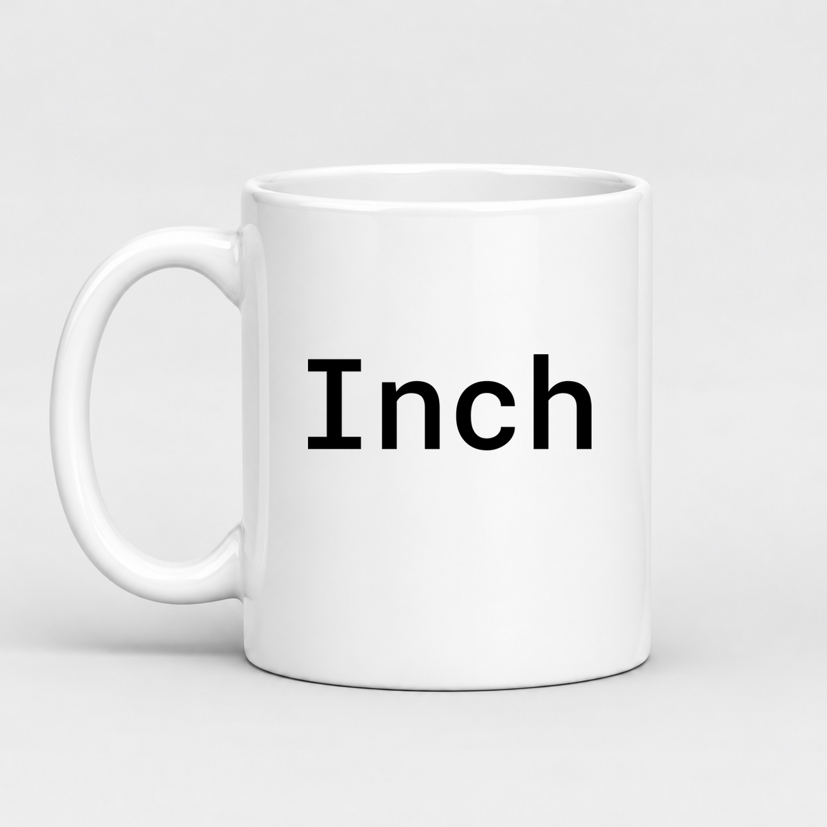 Inch Mug in white with handle left