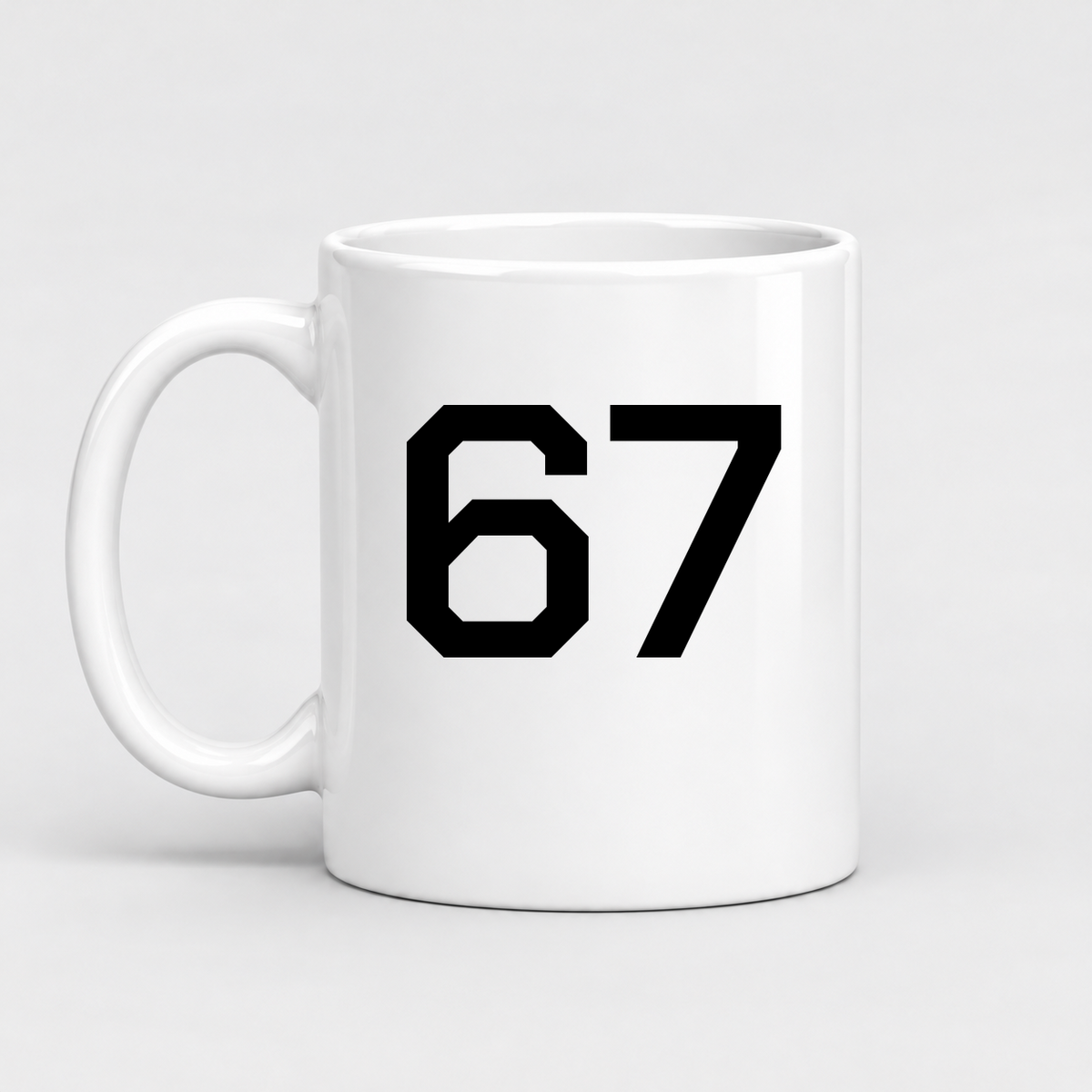 67 Mug in white with handle left