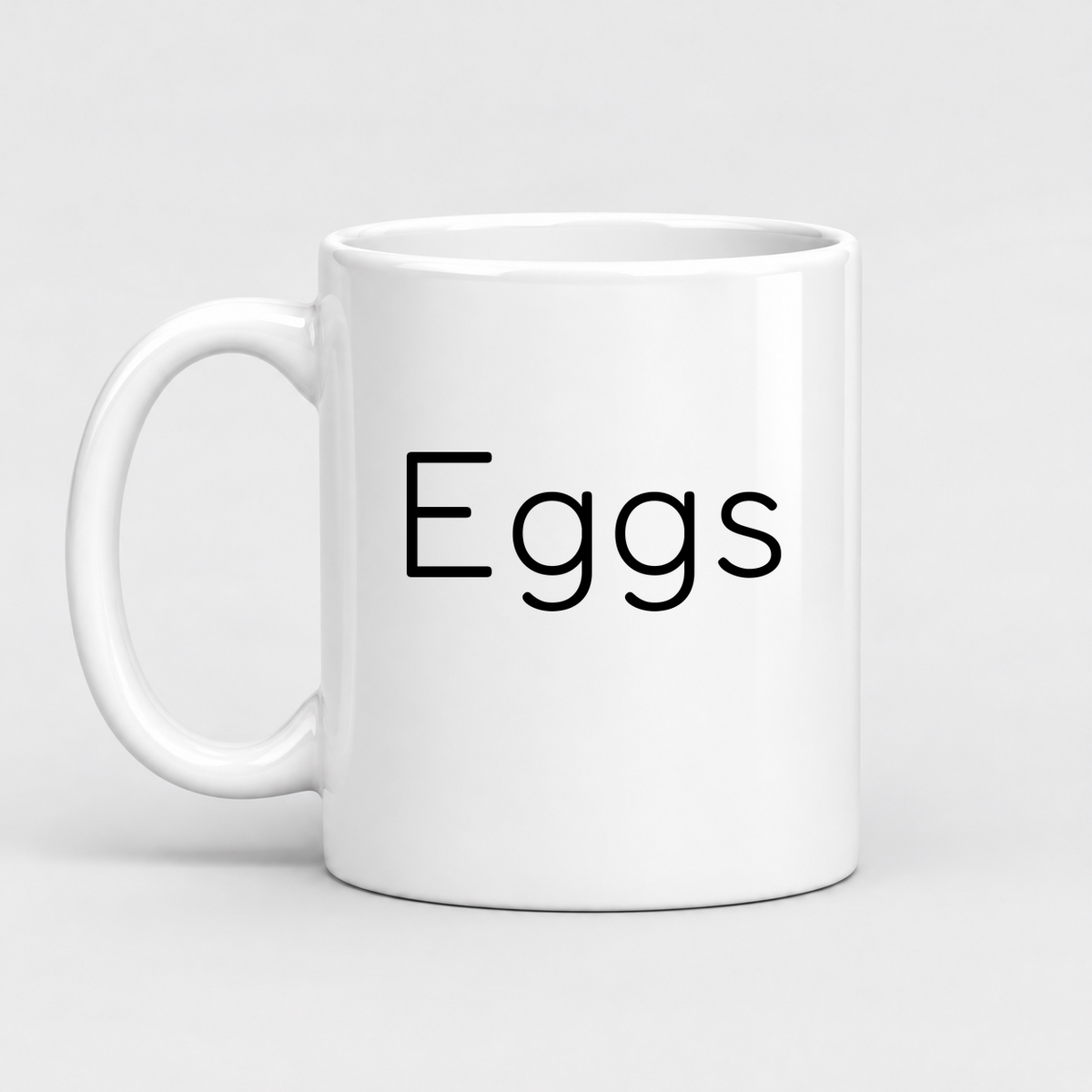 Eggs Mug in white with handle left