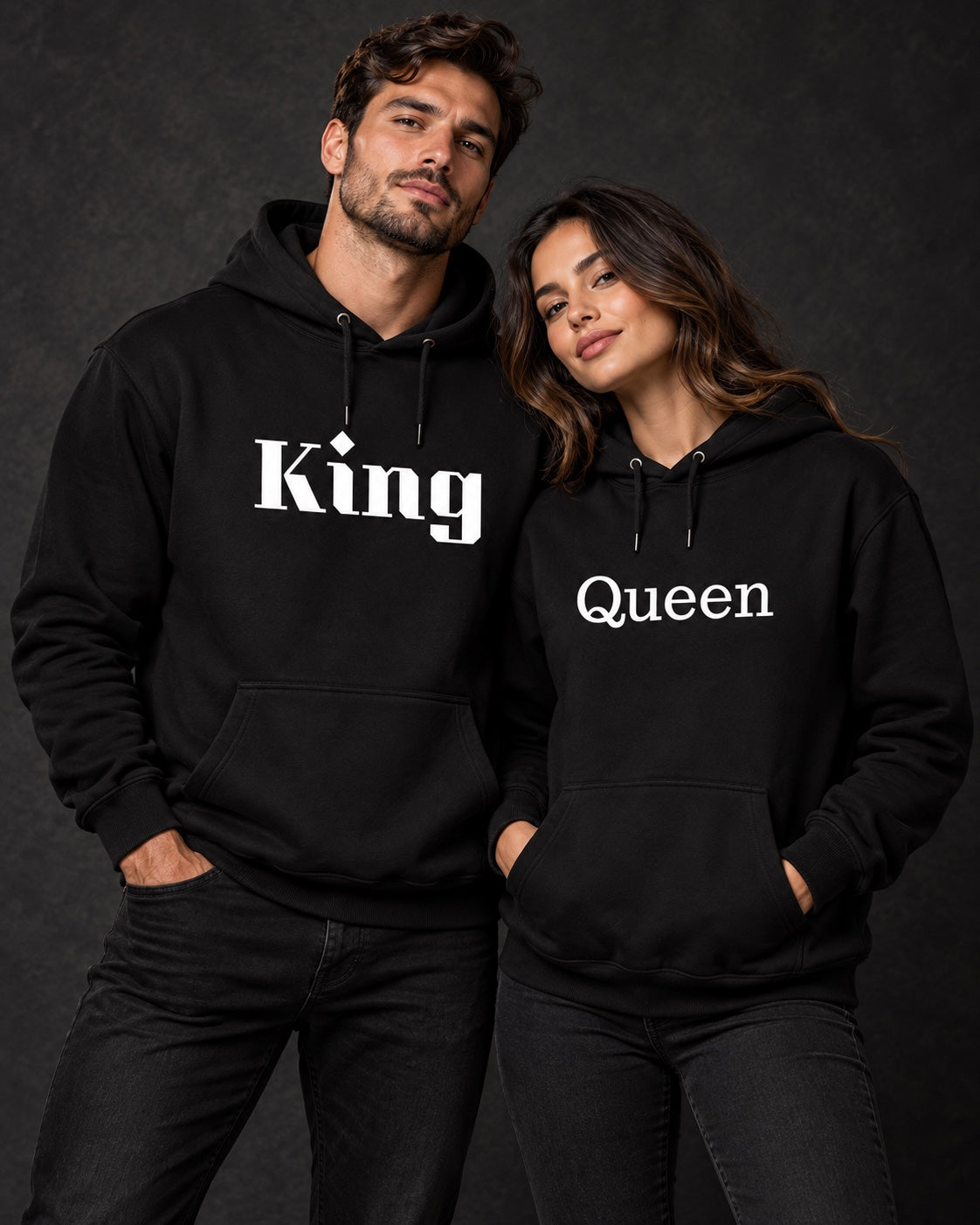 Two models wearing King and Queen hoodies