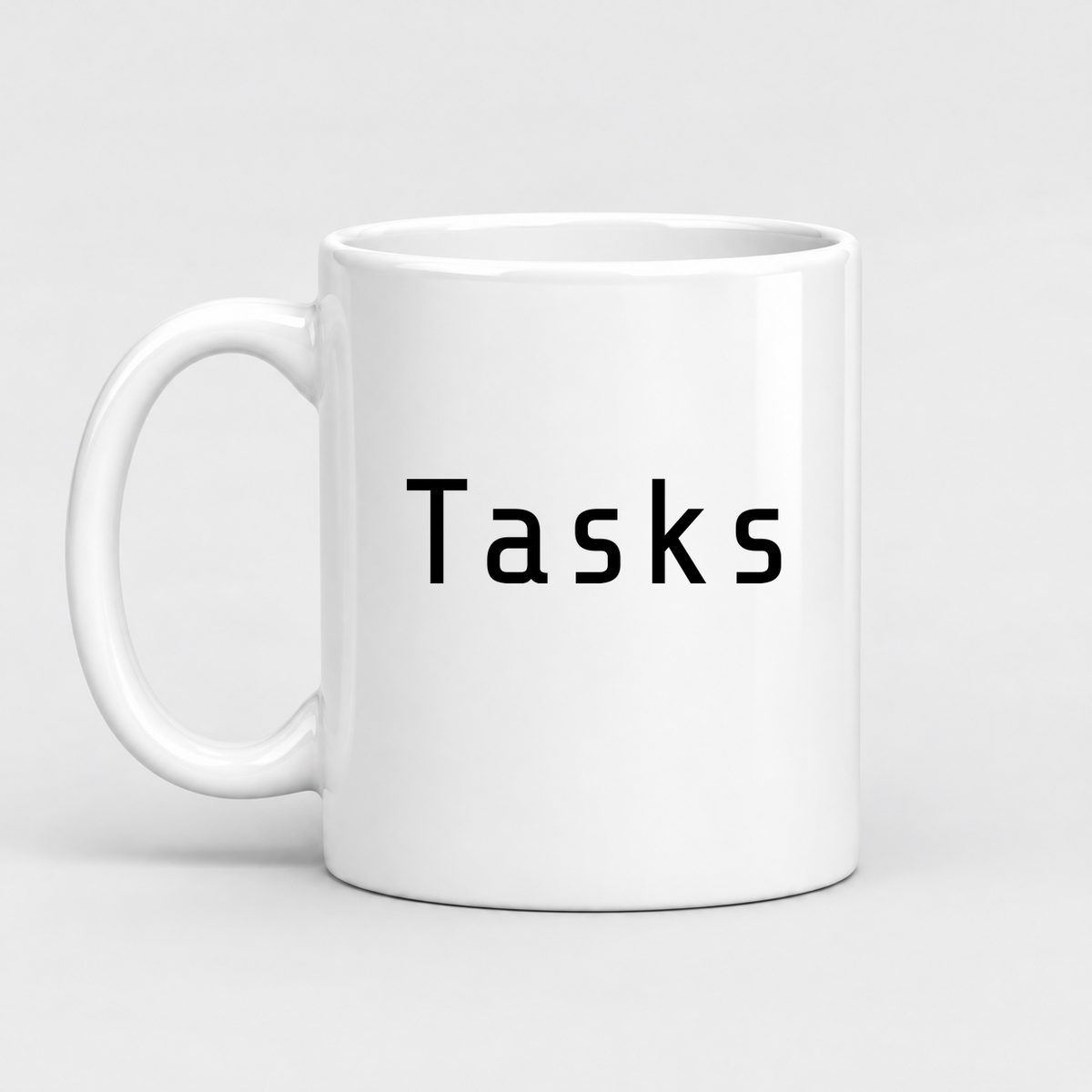 Tasks Mug in white with handle left